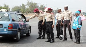 PIC. 12. FRSC ZONAL COMMANDER, ASSISTANT CORPS MARSHAL, CHARLES THEOPHILUS (L), WITH SECTOR COMMANDER, CORPS COMMANDER OLUMIDE OLAGUNJU, AT THE COMMENCEMENT FRSC "OPERATION SHIELD" ON KADUNA - ABUJA HIGH WAY IN KADUNA ON MONDAY (6/5/13) .
