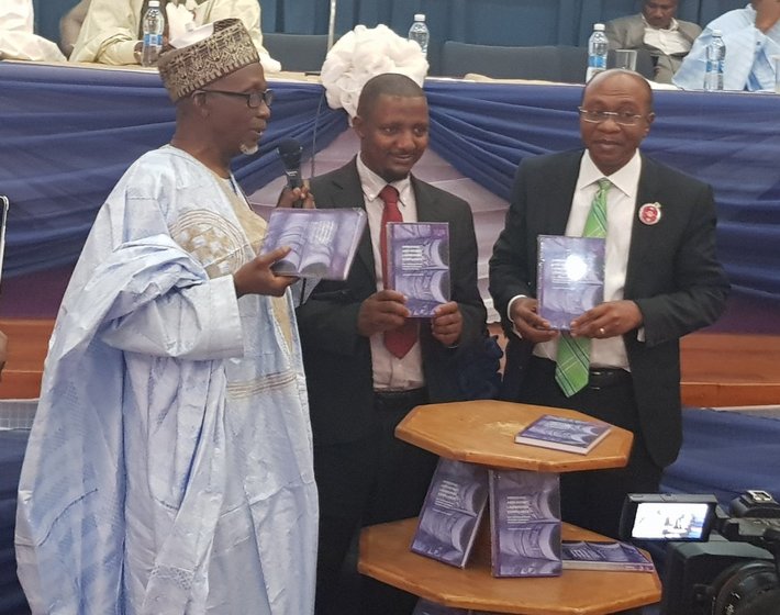 Amb Ibrahim Yerima, Dr Abdullahi Usman Bello Author, Mr Godwin Emefiele CBN Gov at book launch on Anti-Money Laundering