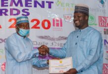 Air Comdr Yusuf Anas of CCC presents SAEMA award to Dr. Mohammed Goje of YOSEMA
