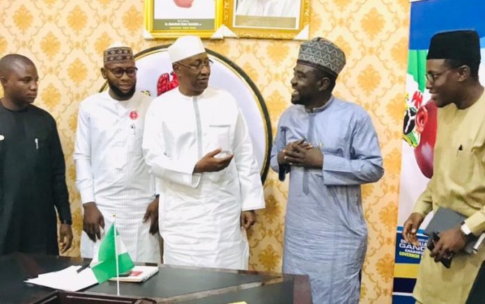 Commissioner of Information, Kano Mallam Muhammad Garba with IMPR Staffs