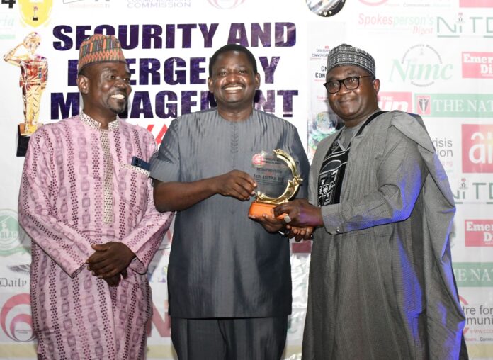 Yushau Shuaib of NIPR, Femi Adesina, Presidential Spokesperson and Mal Mukhtar Sirajo, President of NIPR as Security and Communication Awards in Abuja