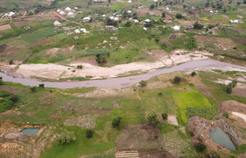 Abandoned mining pits on farmland near a stream in the Sabon Barki area of Plateau state scaled