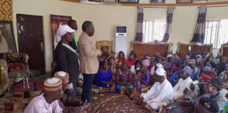 Participants at the e-Naira sensitisation workshop (R) at the Etsu of Bwari Palace listening with rapt attention to the organisers (L) led by the CEO of GOGETIT Investment Ltd, Mr Kenneth Hembe.