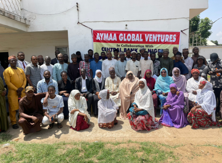 A cross-section of eNaira sensitisation agents in a group photograph after a briefing by the Central Bank of Nigeria (CBN) and Aymaa teams in Malaali, Kaduna on Wednesday.