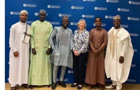 With Karen Walker, PhD our institute Program Executive at the Presidential Precinct posing for a photo on Eid day