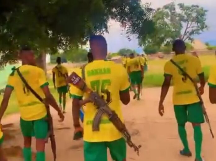 Footballers with AK47 Rifles