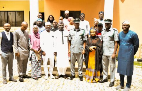 IMPR Staff and The Acting Comptroller-General of the Nigeria Customs Service (NCS), Mr Bashir Adewale Adeniyi