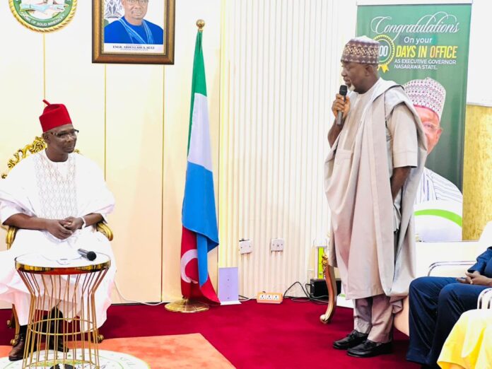 Governor Abdullahi Sule (L) listening to the Executive Secretary of the National Sugar Development Council (NSDC), Mr Kamar Bakrin (R), who paid him a courtesy visit in the Government House in Lafia, Nasarawa state.