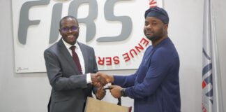 The Chairman of the Independent Corrupt Practices and Other Related Offences Commission (ICPC), Dr Musa Adamu Aliyu (L), and his Federal Inland Revenue Service (FIRS) counterpart, Mr Zacch Adedeji, during a meeting