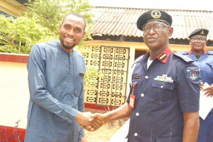 Advocacy and Communication Specialist, CISLAC/TI-Nigeria, Abubakar Jimoh and The Commandant of the Nigeria Security and Civic Defence Corps, Enugu State Command, Otoibhi Ehi Cyprian