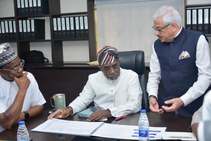 The Executive Secretary of the National Sugar Development Council (NSDC), Mr. Kamar Bakrin (M); his Senior Adviser, Mr. Teslim Bello (L); and the representative of India’s Uttam Sucrotech International, Mr. Sanjiv Gulati (R), at the meeting.