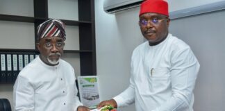 The Executive Secretary of the National Sugar Development Council (NSDC), Mr. Kamar Bakrin (L), receiving the president of the Abuja Chamber of Commerce and Industry (ACCI), Barrister Emeka Obegolu, SAN (R), who led a delegation to pay him a courtesy visit in his office.