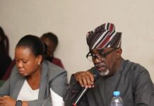 The Executive Secretary of the National Sugar Development Council (NSDC), Mr. Kamar Bakrin (R), addressing the House of Representatives Committee on Industry and other stakeholders during a one-day public hearing on the amendment of the Council’s Establishment Act while NSDC’s Head of Strategy and Performance Management (SPM), Ms. Edirin Akemu (L) looks on.